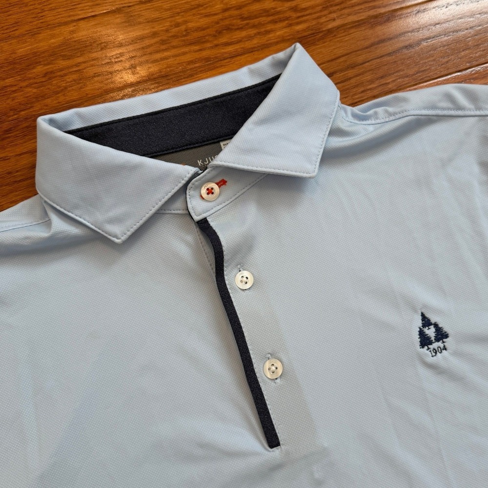 KJUS Andrews Cooling Golf Polo Shirt Mens Medium Light Blue Stretch Tree Logo
